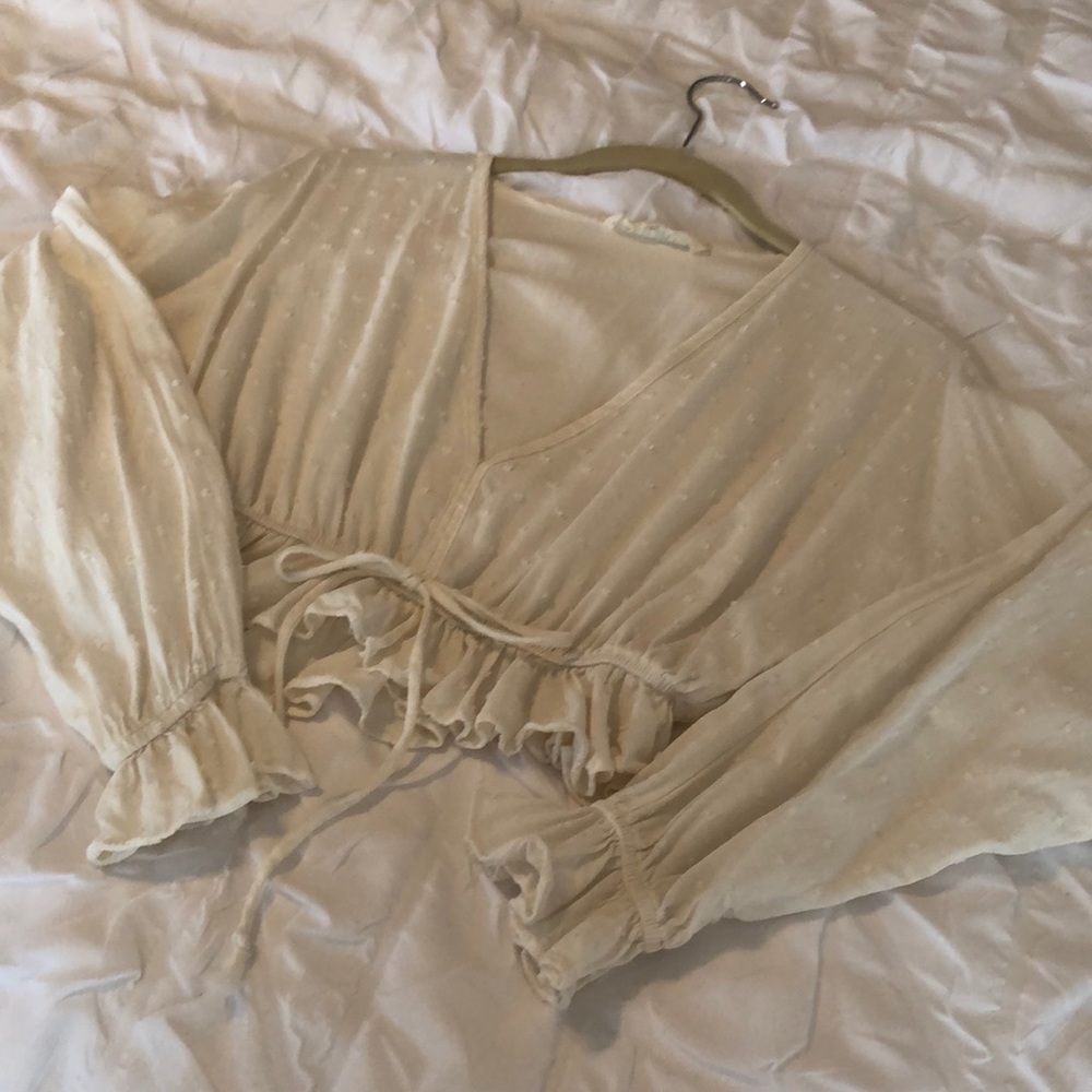 Cream top with textured dots